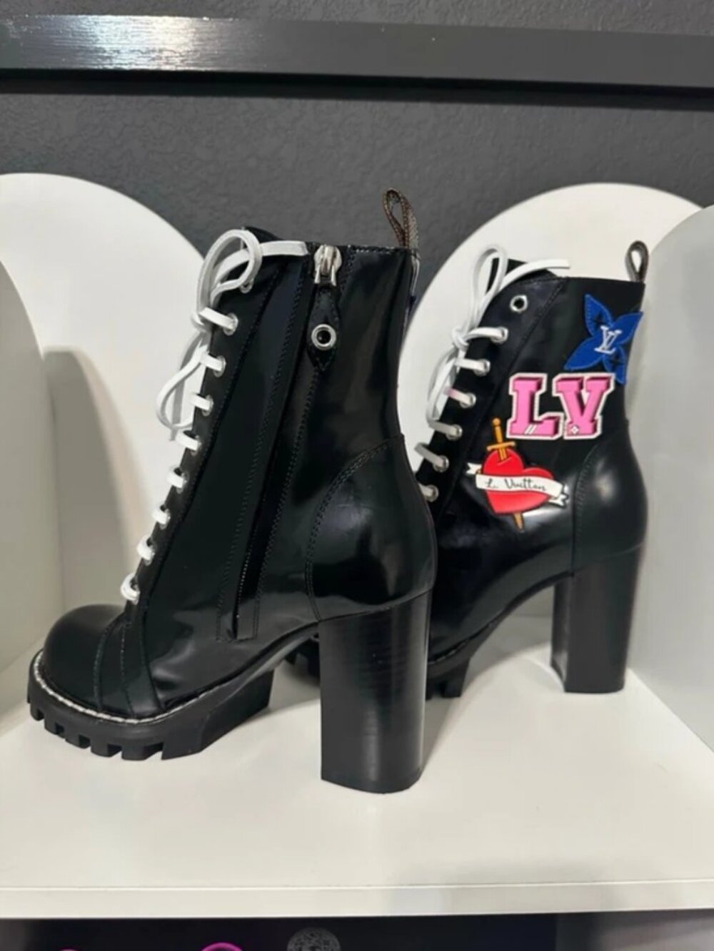 Leather printed combat heel boots LV